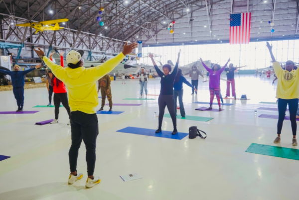 Group of Black people practicing yoga together