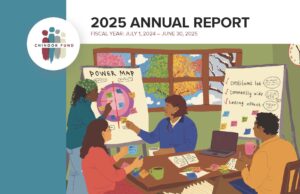 Four people of color sitting in a meeting room working on a power map